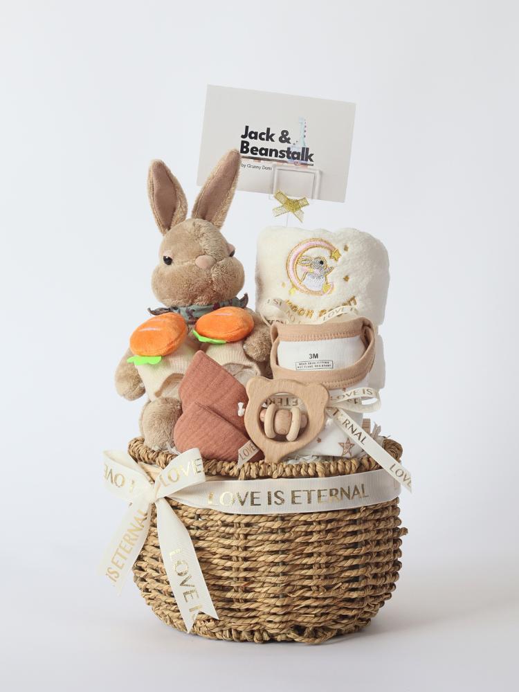 
                      
                        The Tale of Peter Rabbit Baby Hamper
                      
                    